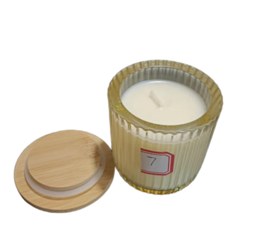 Soy wax candle in clear glass jar