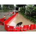 Freestanding flood boxwall flood protection for urban road