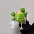 Plush little frog pendant in chubby sitting position