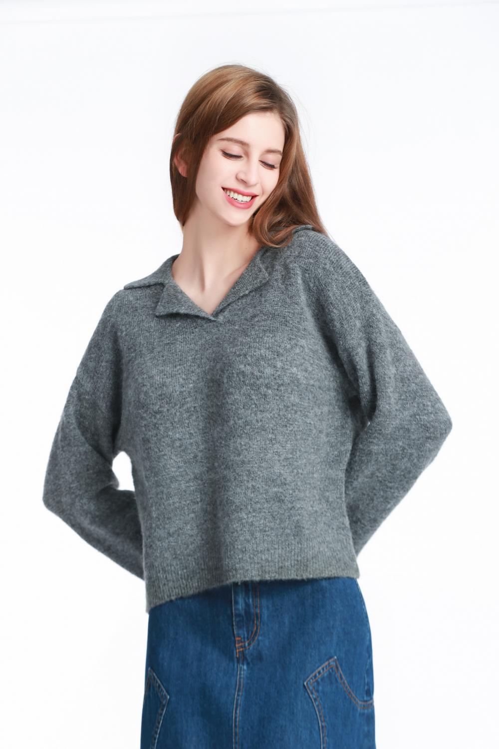 Top a maglia in lana a maniche lunghe con abbottini