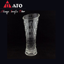 Clear machine-made vase with slanted top glass vase