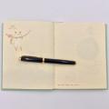 Einfaches Notizbuch aus Papier mit Grafik