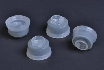 composite cap for plastic infusion container
