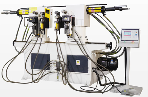 Pipe bending machine with dual heads