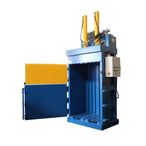 Vertical hydraulic baler machine