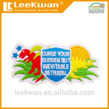 Iron-on style embroidered patch for garments