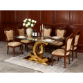 Mesa de comedor de vidrio moderna con base de metal