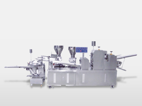 Automatic machine for dual-stuffing flaky pastry