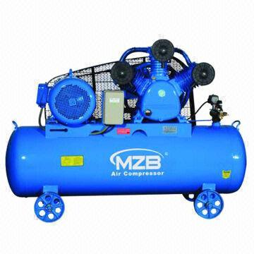 Rotary compressor with belt driven