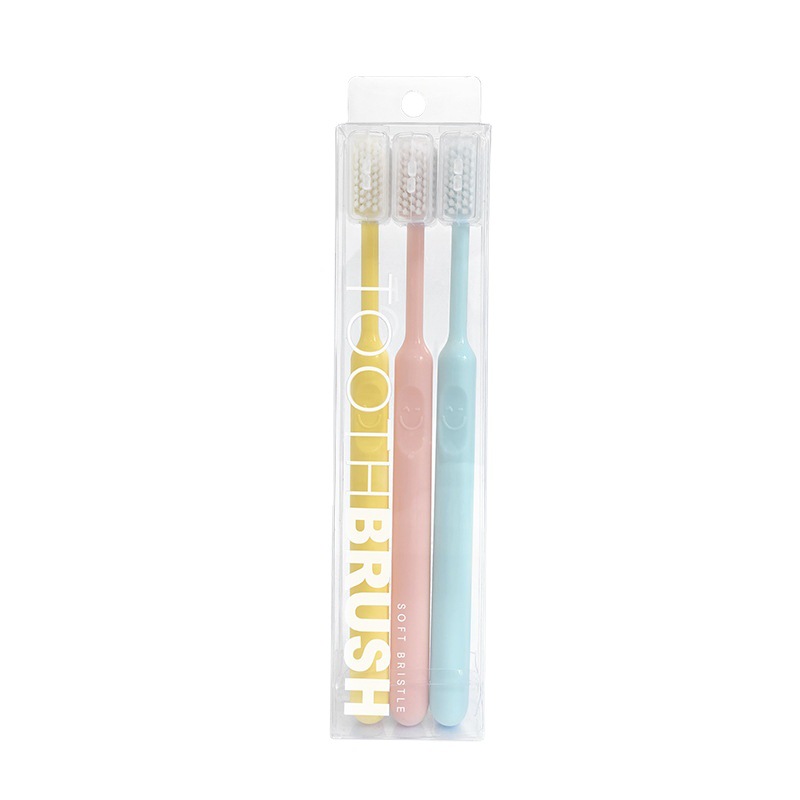 Candy colored smiley face toothbrush