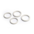 Radially oriented annular sintered neodymium rare earth permanent magnet ring magnet