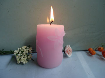 carved flower candle