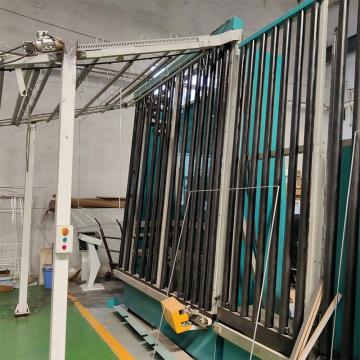 Spacer frame transfer machine for spacer conveying