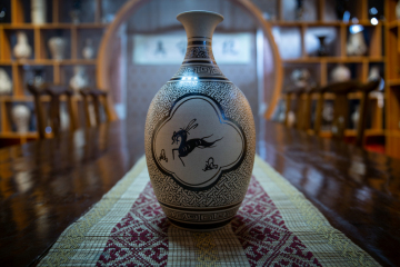 Underglaze painted antique fine neck bottle