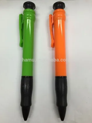 green and orange giant retractable plastic pen