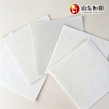 Short filament composite geomembrane