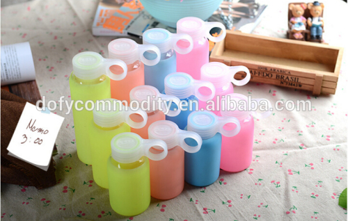 Alibaba different color beautiful glass water bottle with silicone sleeve for sale