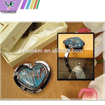 The table round hang bag holder the hang bag buckles portable bag holder