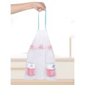 Large drawstring garbage bag on roll