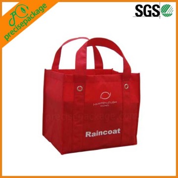 Recycle red non woven carrying bags with metal eyelet