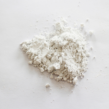 Odorless calcium carbonate carrier additive