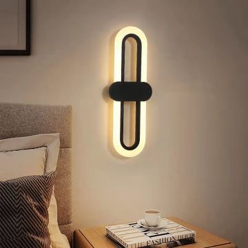 Modern Minimalist Black Oval Living Room with Gold Wall Lights