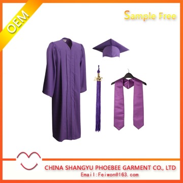 Purple graduation gown cap with tassels and stole