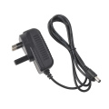 EE. UU. EU 9V 1A Adaptador de montaje de pared