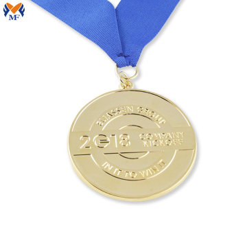 Gold and bronze award medallion produce as requirements