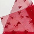 Tessuto in tulle di poliestere con fiocco glitterato in schiuma