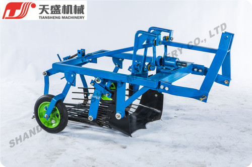 Tractor mounted potato digger with PTO shaft