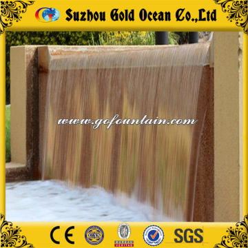 Cascading Water Over Cultural Rock Artificial Waterfall China