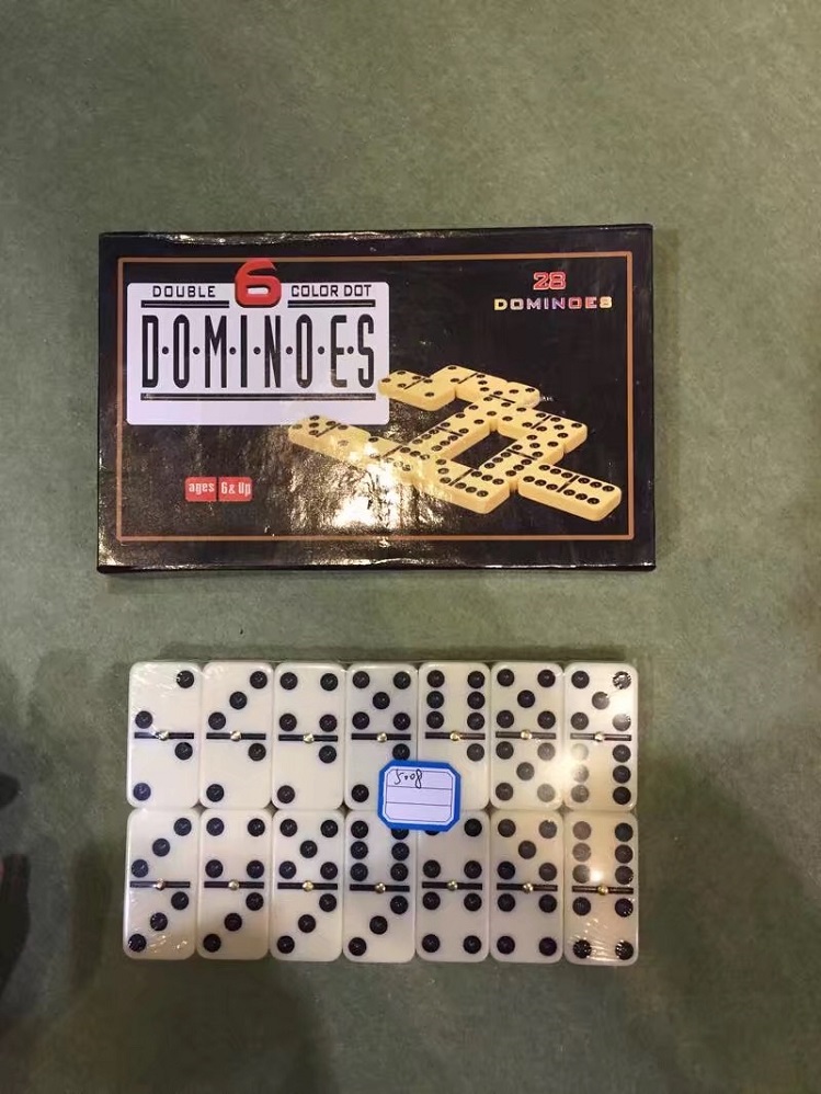 dominoes in color box