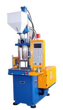Small vertical injection molding machine
