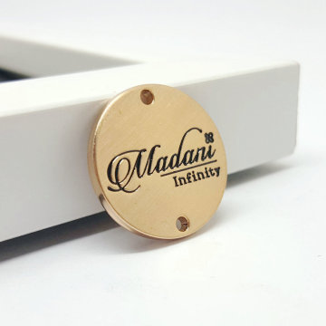 Matte Gold Plated Sewing Hollow Custom Round Metal Labels for Clothing and Bags