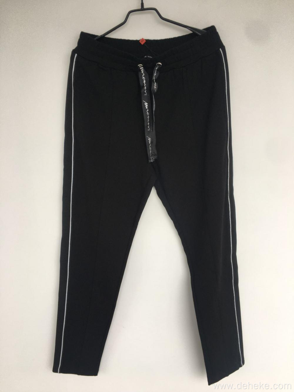 Women's knit decrop tape trousers