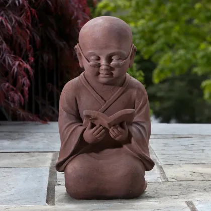 Cheap and fine little black buddha statue stone little monk sculpture for garden