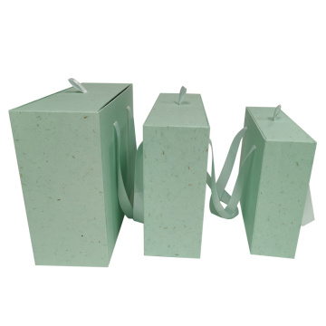 Bio-degradable sliding drawer box with portable handle