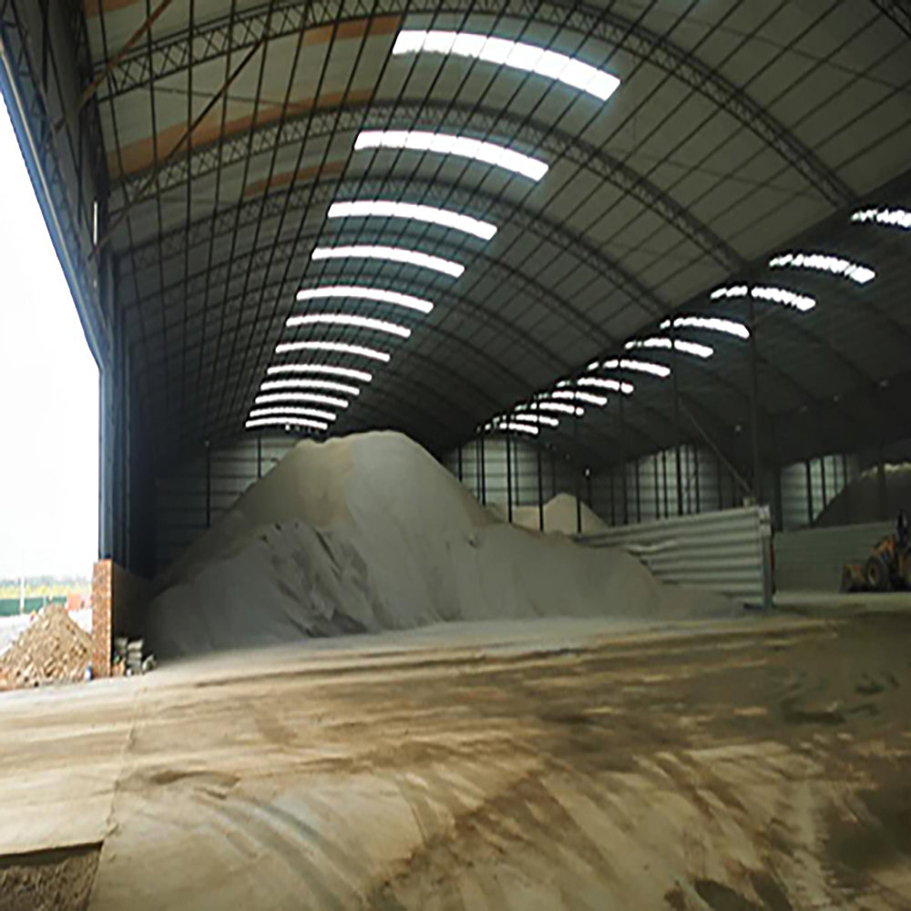 Raw material storage and transportation system for high efficiency grinding plant