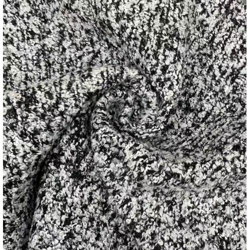 Tejido bouclé suave y elegante