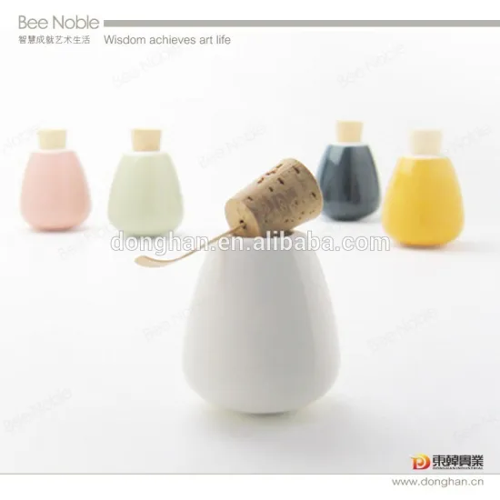 porcelain castor with cork lid and spoon