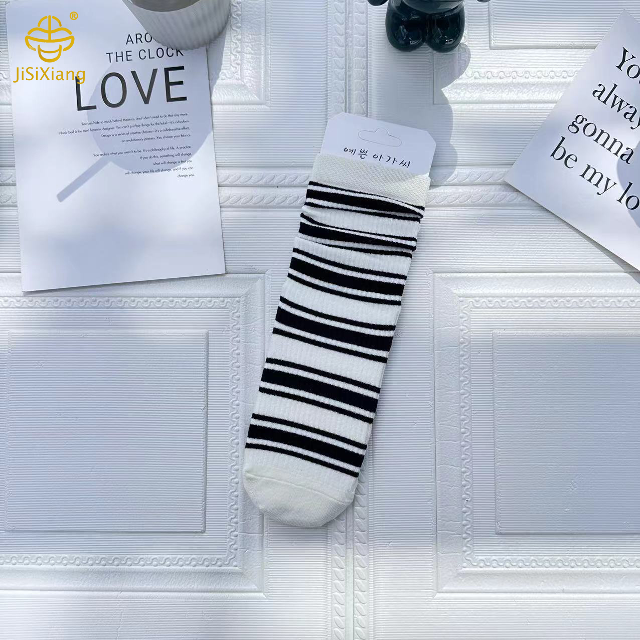 Pile of socks with black and white stripes