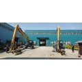 Excavator converted into photovoltaic drilling rig