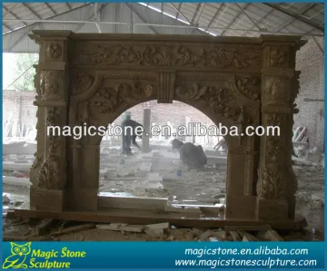 antique arched stone fireplace
