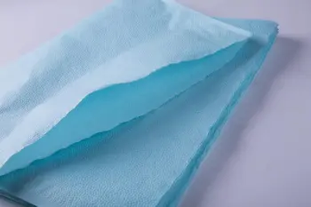 Tissue with PE laminated disposable dental headrest cover