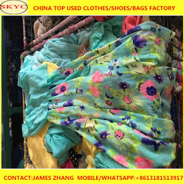 Original textile bank used second hand clothing and shoes in bales