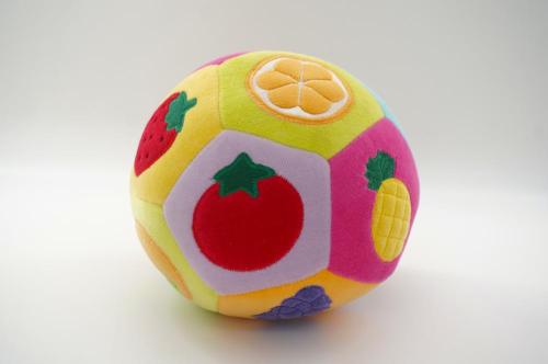 Plush ball with different fruit on the surface