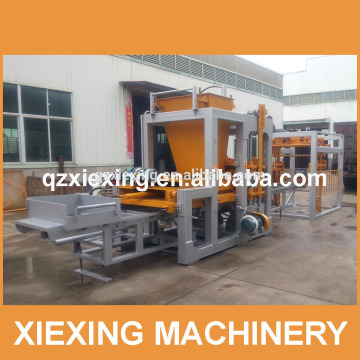 Automatic concrete brick machine