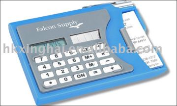 Calculator with business card holder and pen