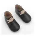Botas de zapatos de invierno de bebé de cuero de vaca de calidad
